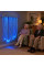 Senior living common space with residents near the glowing Fiber Optic Jellyfish strands