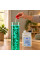 A measured dose of fluid being poured into a bubble tube column