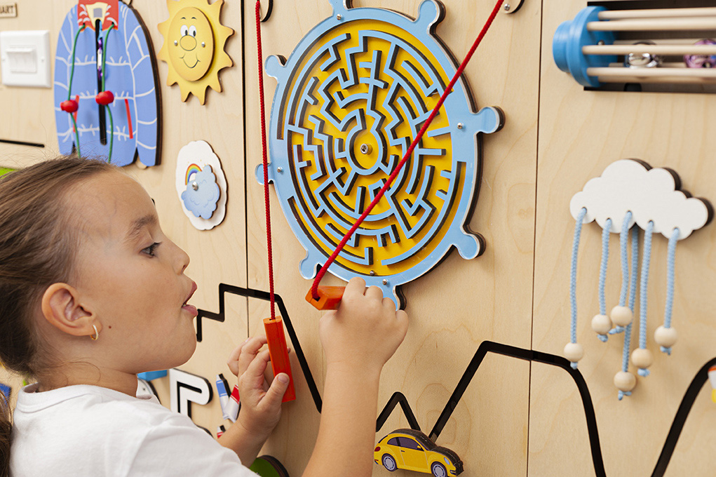 Best sensory wall panels for kids Sensory wall panels installed in a preschool learning space