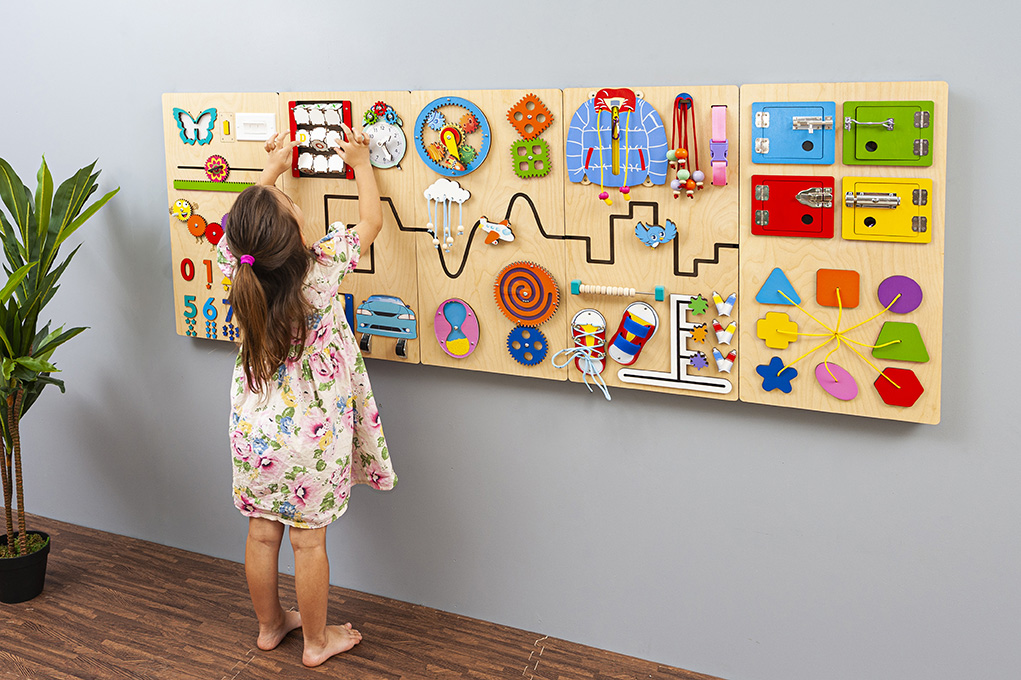 Modular sensory wall panels for classrooms Modular sensory wall panels installed in a classroom for preschool children