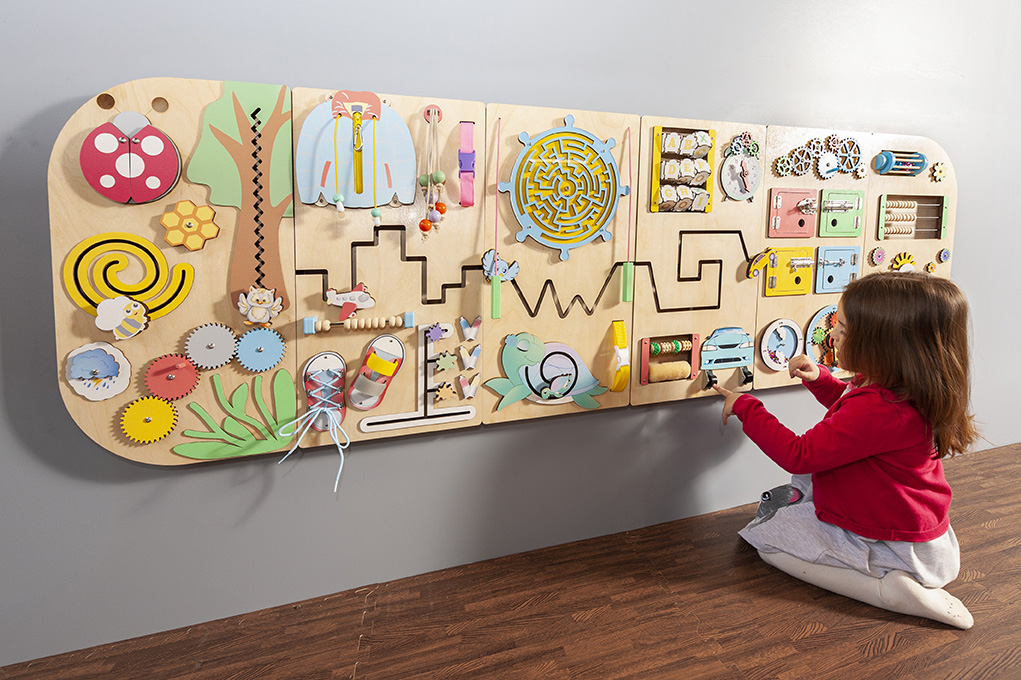 Wall-mounted sensory panel for hands-on learning Wall-mounted busy board panel supporting calm hands-on sensory play